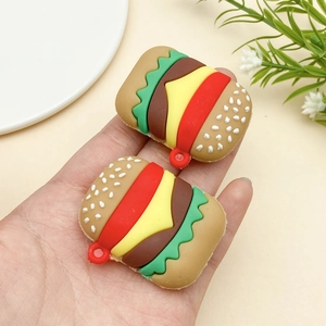 Macro shot of realistic burger keychain charm with layered bun meat and cheese details