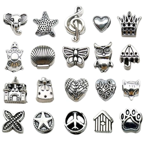 Assorted vintage silver alloy charms set featuring crown starfish and mixed themes for DIY