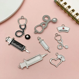 Silver alloy medical charms set with stethoscope and syringe for DIY jewelry
