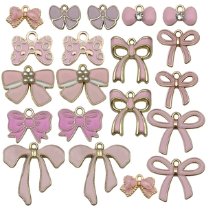 Pink and lilac enamel bow charms in alloy with pearls and rhinestones for DIY jewelry