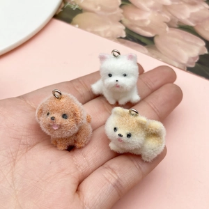 Three cute flocked mini animal charms including teddy dog and puppy with metal hooks