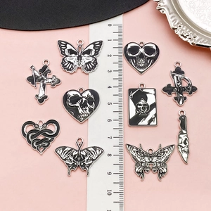 Gothic skull butterfly and dagger charms in black and white enamel for DIY jewelry