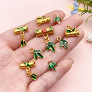 Traditional gold bamboo pendant with green enamel and Fu character charm for jewelry DIY