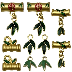 Bamboo style matte gold DIY pendant set with green leaves and red Fu character charms