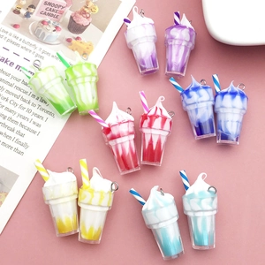 Detail of colorful resin ice cream charms with metal rings for DIY jewelry making
