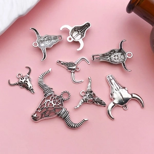 Set of 8 antique silver bull skull charms for DIY necklaces and earring accessories