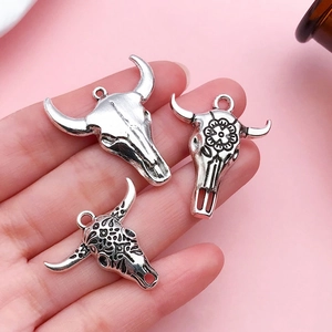 Three styles of antique silver bull skull pendants for DIY jewelry making and necklaces