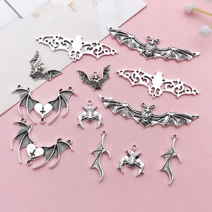 Detailed collection of antique silver bat charms with heart and gothic cross for DIY jewelry