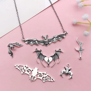 Antique silver bat pendant necklace and DIY jewelry charms set with gothic bat motifs