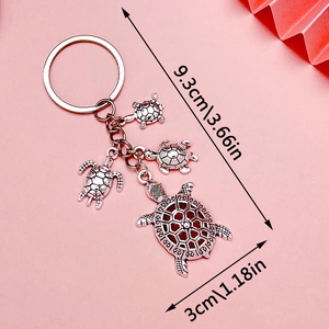 Porte-clés tortue marine style océan de 9,3cm avec gravures sur métal et pendentifs