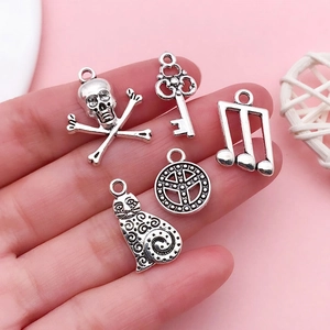 Set of 5 antique silver alloy pendants including skull, key, and music note for DIY jewelry