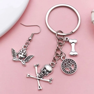 Vintage silver mixed alloy charms with angel, skull, and peace sign for DIY jewelry