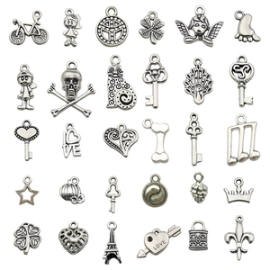 30pcs vintage silver alloy pendant charms set for DIY jewelry making on white background