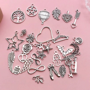 Assorted antique silver alloy charms including life tree and hearts for DIY jewelry making