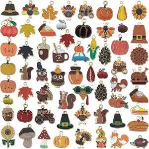 Variety of colorful Thanksgiving autumn charms with pumpkin, turkey, and maple leaf motifs