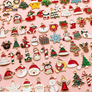 Mix of 135 Christmas alloy enamel charms featuring Santa, tree, and reindeer for DIY jewelry