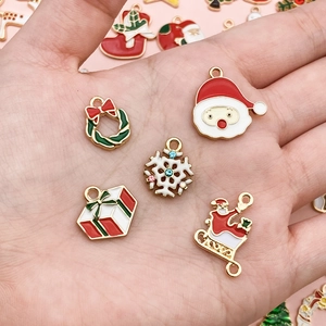 Five-piece Christmas enamel pendant set featuring Santa Claus and snowflake charms