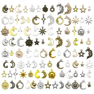 Mixed celestial sun moon star vintage metal pendants in various finishes for DIY jewelry
