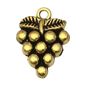 Detailed view of antique gold grape charm with leaf texture and ring for DIY jewelry