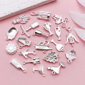 Silver alloy wine themed DIY charms including wine bottles and glasses on pink background