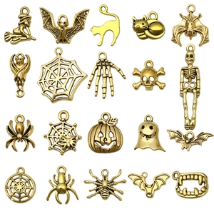 20pcs set of antique gold Halloween charms featuring skulls, spiders, and bats