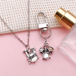 Vintage silver drum set necklace and keychain pendants for DIY musical jewelry crafts