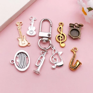 Mix de breloques instruments de musique guitare et violon pour création de bijoux DIY