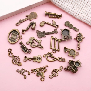Vintage bronze music theme DIY charms including guitar and violin for jewelry making