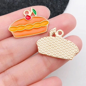 Detailed front and back view of cherry pie enamel alloy pendant with golden metal grid