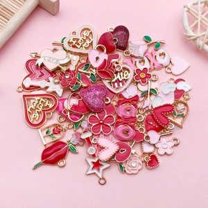 Pink heart and rose charms set with gold enamel for Valentine jewelry making