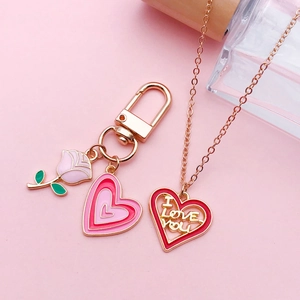 Pink rose and heart charms necklace with I LOVE YOU engraving on gold keychain