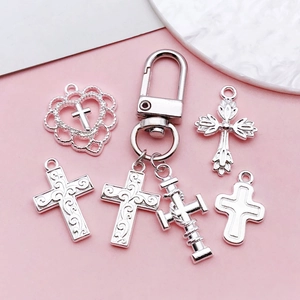Set of silver alloy cross pendants with intricate filigree and D-ring keychain hook