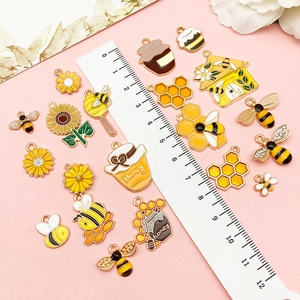 Lot de breloques émaillées en forme d'abeille et de tournesol pour bijoux DIY