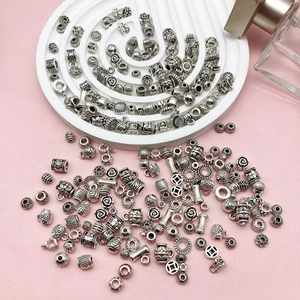 Perle distanziatrici vintage in argento con motivi floreali e stelle per gioielli DIY
