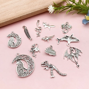Lot de 12 breloques animales vintage dont loup, dragon et renard pour bijoux DIY