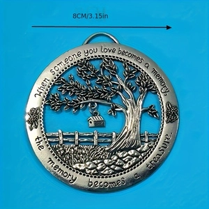 Macro detail of silver Tree of Life memorial ornament featuring 8cm diameter measurement