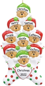 Detail of Christmas tree ornament with nine bear family members in festive hats
