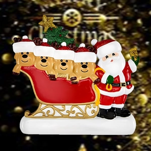 Christmas Santa Claus and reindeer family on a red sleigh holiday ornament decoration