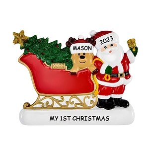 Customized 2023 My 1st Christmas ornament featuring Santa, reindeer, and a red sleigh