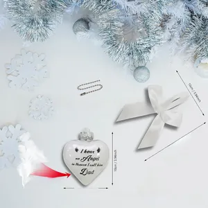 Λεπτομερές χριστουγεννιάτικο στολίδι καρδιά με λευκά φτερά και μεταλλικό άγγελο
