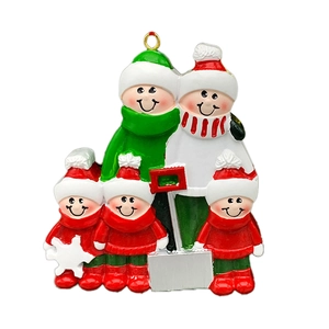 Close-up of a resin family sleigh ornament with five members for Christmas DIY decor