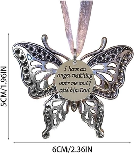 Detailed view of silver butterfly memorial ornament with engraved Father tribute and pink ribbon