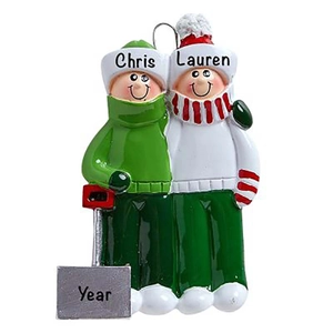 Close-up of personalized resin family Christmas sled ornament with customizable names