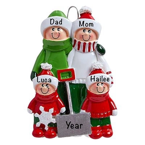 Custom resin family of four Christmas ornament featuring a sledding scene and names