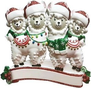 Macro detail of Christmas alpaca family resin ornament with glitter hats and festive scarfs