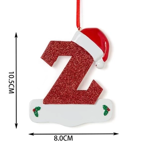 Christmas letter Z ornament with red glitter finish and santa hat, 10.5cm height