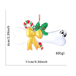 Detailed dimensions of resin dog bone Christmas ornament with festive red and green holly