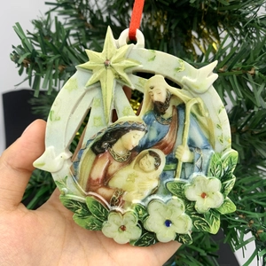 Round resin Nativity scene Christmas ornament with Holy Family and Star of Bethlehem