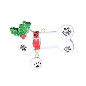 Dog bone Christmas ornament with festive holly leaves and hanging paw print charm