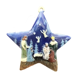 Star-shaped resin ornament with hand-painted Nativity scene and Bethlehem star for holidays